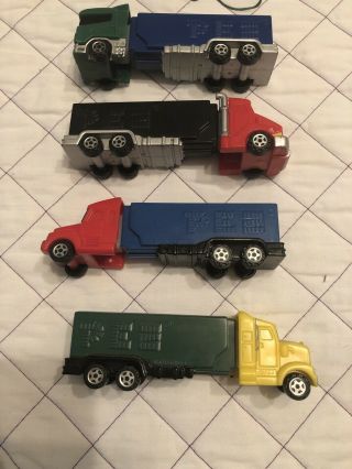 Set Of 4 Eighteen Wheeler Trucks.  Pez Dispenser.