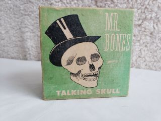 Vintage H.  Fishlove & Co.  Brand No.  666 " Mister Bones " Talking Skull Windup Toy
