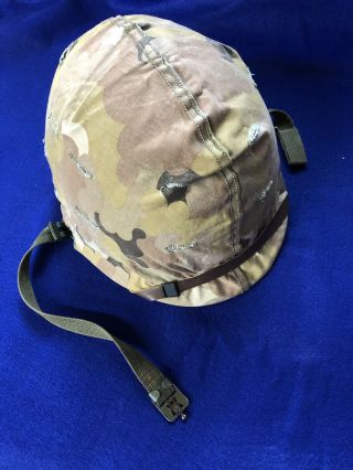 Korean War Era M - 1 Helmet With Liner,  Chinstrap And Camouflaged Cover