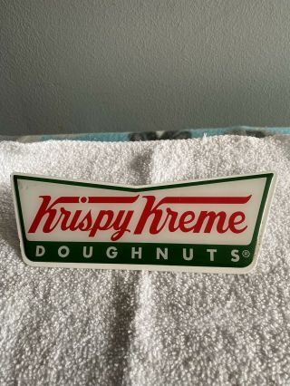 Krispy Kreme Doighnuts Shelf Sign 7”x2 1/2” Age Not Known