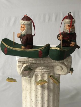 2 Vintage Folk Art Hand Carved & Painted Wood Santa Fishing Canoe Christmas