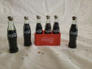 Set Of 6 Vintage 3” Mini Coca Cola Bottles W Plastic Crate / Liquid In Bottles