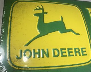 John Deere Embossed Metal Sign " Nothing Runs Like A Deere " Collectible Sign
