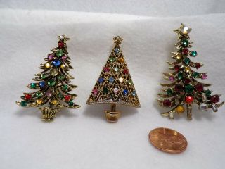 Three Vintage Hollycraft Christmas Brooches