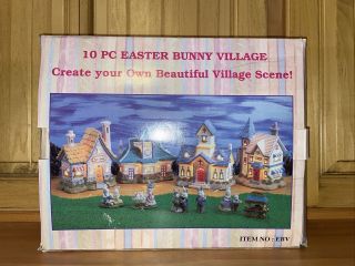 10 Piece Easter Bunny Village Lights Up Toy Shop Station House.