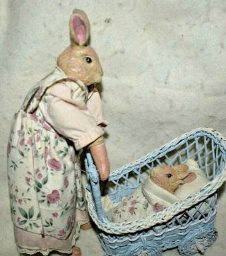 T1=estate Easter Decor: Mama Bunny Pushing Wicker Baby Buggy With Baby Look