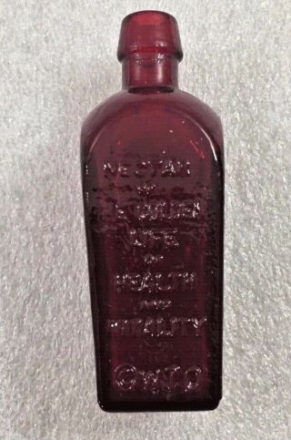 Straubmuller ' s Elixar Tree of Life ruby red miniature bottle 3.  25 