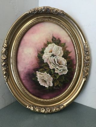 Oil On Canvas.  White/pink Roses.  Oval.  Signed & Dated 13” X 10”.  Framed.