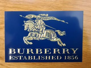 Burberry,  Year Est Brass Advertising Retail Plaque.  115 X 74mm