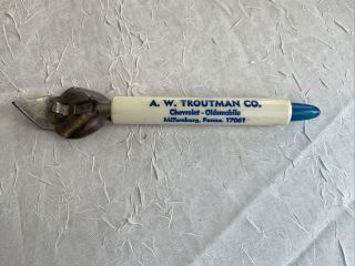 Vintage A.  W.  Troutman Co Bottle Can Opener Millersburg Pa Chevrolet Blue Bulb