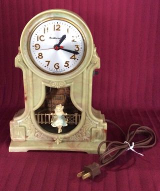 Mastercrafters Electric Lighted Swinging Girl Clock