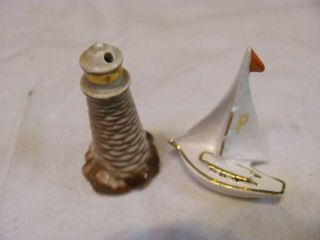 Vintage Arcadia Minature Salt And Pepper Shakers,  A Light House And A Sail Boat