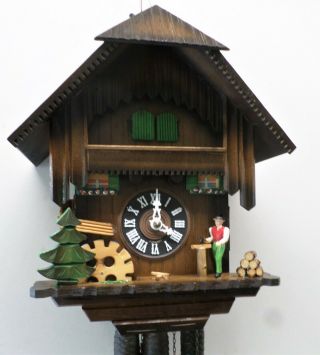 German Black Forest Musical Wood Chopper Water Wheel Chalet Cuckoo Clock