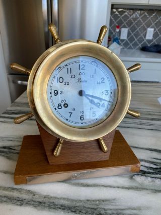 Chelsea Company Brass Ship Wheel Clock,  And Chiming Properly