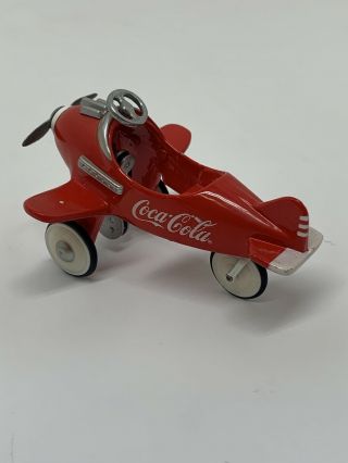 Coca Cola Miniature 3 1/2 " Pedal Airplane 1997