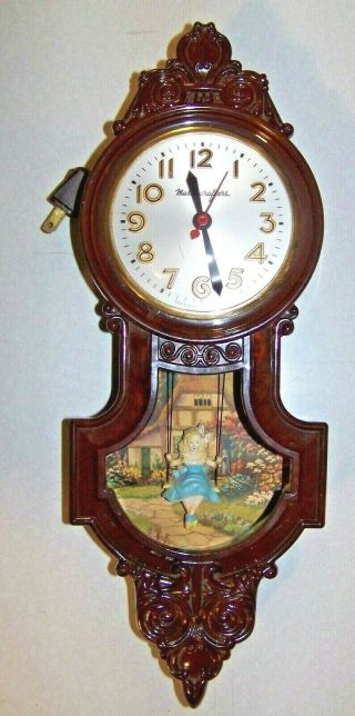 Mastercrafters Electric Swinging Girl Wall Clock