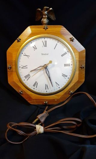 Vintage United Roman Numeral Wood Electric Wall Clock Brass Eagle Finial