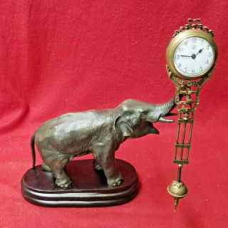 Elephant Mystery Swinger Clock - - Display Clock With Motion