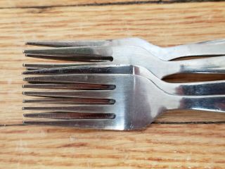 4 ANTIQUE VINTAGE COLLECTABLE STAINLESS STEEL FORKS 6.  5 
