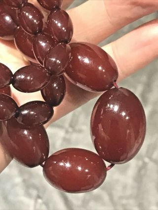 Early Cherry Amber Bakelite Oval Barrel beads Necklace 67 grams 2