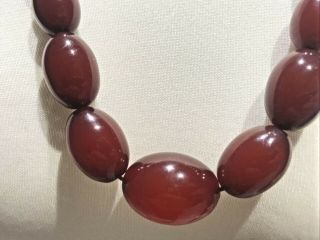 Early Cherry Amber Bakelite Oval Barrel beads Necklace 67 grams 5