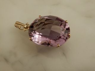 A Stunning 9 Ct Gold Large 25.  00 Carat Oval Amethyst Pendant