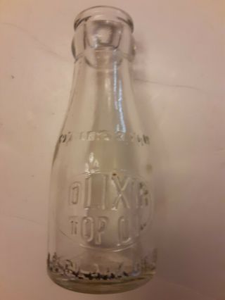 J.  B.  Clark Oil Co.  Oil Bottle,  Olixir Top Oil Clear Bottle,  4 1/4 