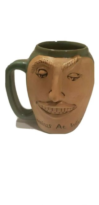 " Genius At Work " Booty Jugs Ugly Face Mug 26oz Green Stoneware About Face Design
