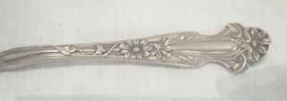 STERLING SILVER BUTTER KNIFE w/ DAISY ON HANDLE,  31.  9 gms BLACKINTON PAT.  1904 2