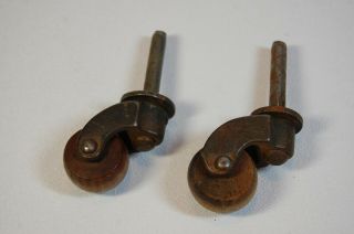 Two (2) Vintage Antique Small Metal Casters With Wood Wheels 2