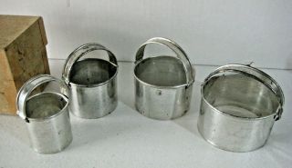 Vintage Metal Four - Piece Donut/biscuit/cookie Cutters