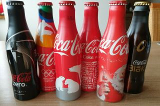 Coca Cola Alu Bottles From Benelux.  Different Promotions.  All Empty