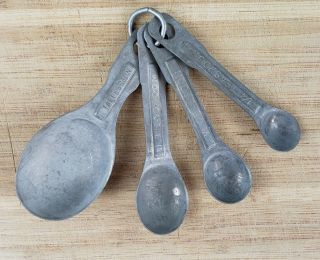 Vintage Aluminum Nesting Measuring Spoons With U.  S.  Std.  Stamped On Largest Of 4