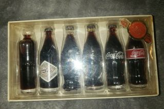100 Anniversary Evolution Of The Coca Cola Contour Bottle - 6 Mini Bottles