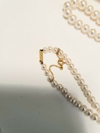 AN BOXED 1950 ' s SIMULATED PEARL NECKLACE WITH 9ct GOLD CLASP BY CIRO 3