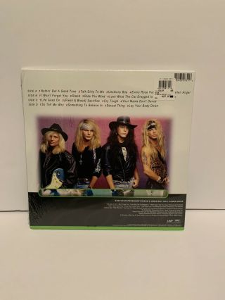 Poison Greatest Hits LP Yellow & Green Neon Walmart Exclusive 2