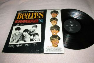 Beatles - Songs,  Pictures And Stories.  Plain Black Label / No Oval Or Brackets