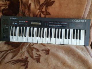 Roland Alpha Juno.  Vintage Polyphonic Analog Synthesizer.  1980s Keyboard.
