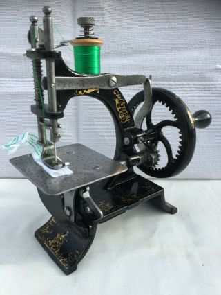 Old Vintage Antique " Muller 10 " Toy Sewing Machine.