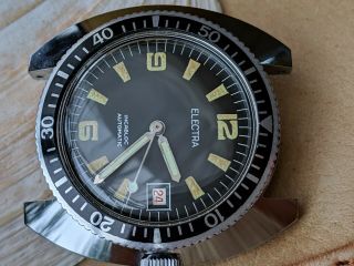 Near NOS Vintage Electra Diver w/All SS Case,  Roulette Date Wheel,  Runs Strong 4