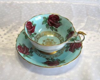 Vintage Paragon Floating Red Roses Cup & Saucer Blue With Gold Trim Porcelain