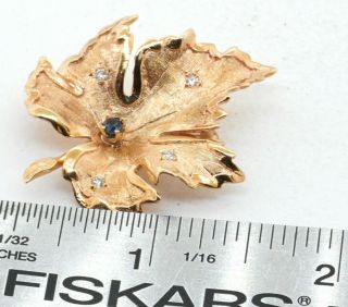 Heavy vintage 14K YG 0.  25CT VS1/F diamond & sapphire maple leaf brooch 4