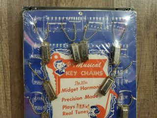 Vintage Pee Wee Mini Harmonica Keychain Store Display 12 Pc.  Rare 11.  5 " X8 "