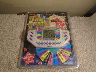 Vintage 1995 Wheel Of Fortune Tiger Electronic Handheld Game Complete In Package