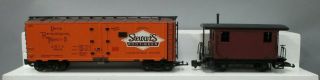 Aristo - Craft and Bachmann G Freight Cars: 46211 Stewart ' s & 93170 Caboose [2] 2