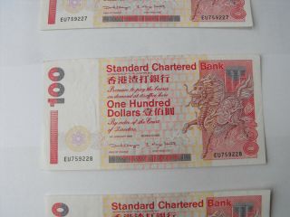 3 Consecutive $100 Hong Kong Dollars Standard Chartered Bank Note dated 1/1/1999 3
