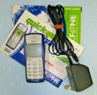 Nokia 1100 Tracfone Cell Phone,  Wall Charger,  Guide (no Sim Card)