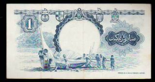 MALAY AND BRITISH BORNEO 1959 ONE $1 DOLLAR NOTE IN A CRISP,  GRADE. 2