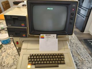 Two Apple Ii Plus Computers 1 With Nec Monitor And Many Accessories.