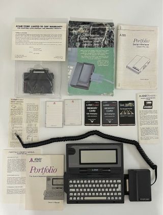 Vintage Atari Portfolio And Accessories Bundle